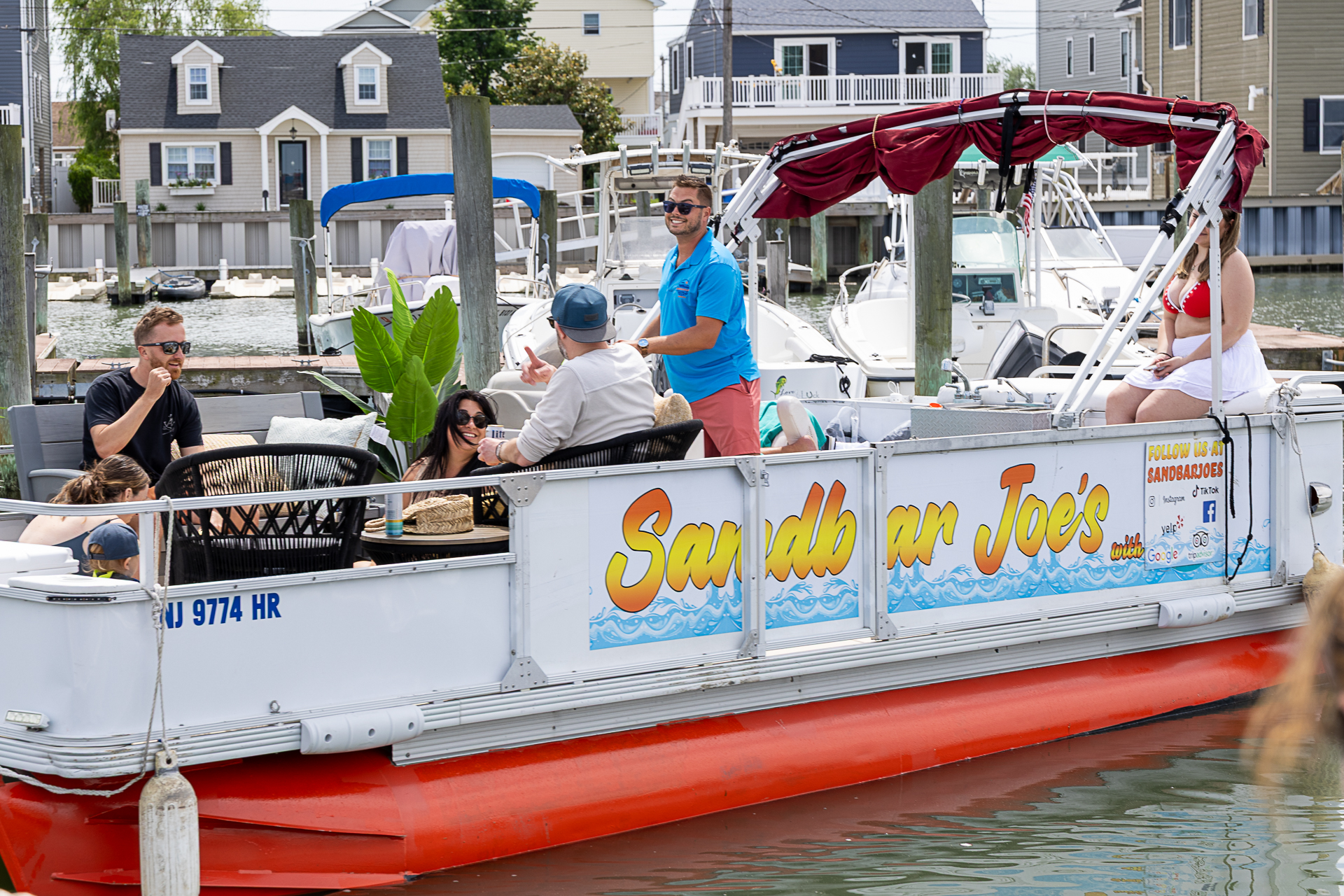 Pontoon cruising past Wildwood salt marsh