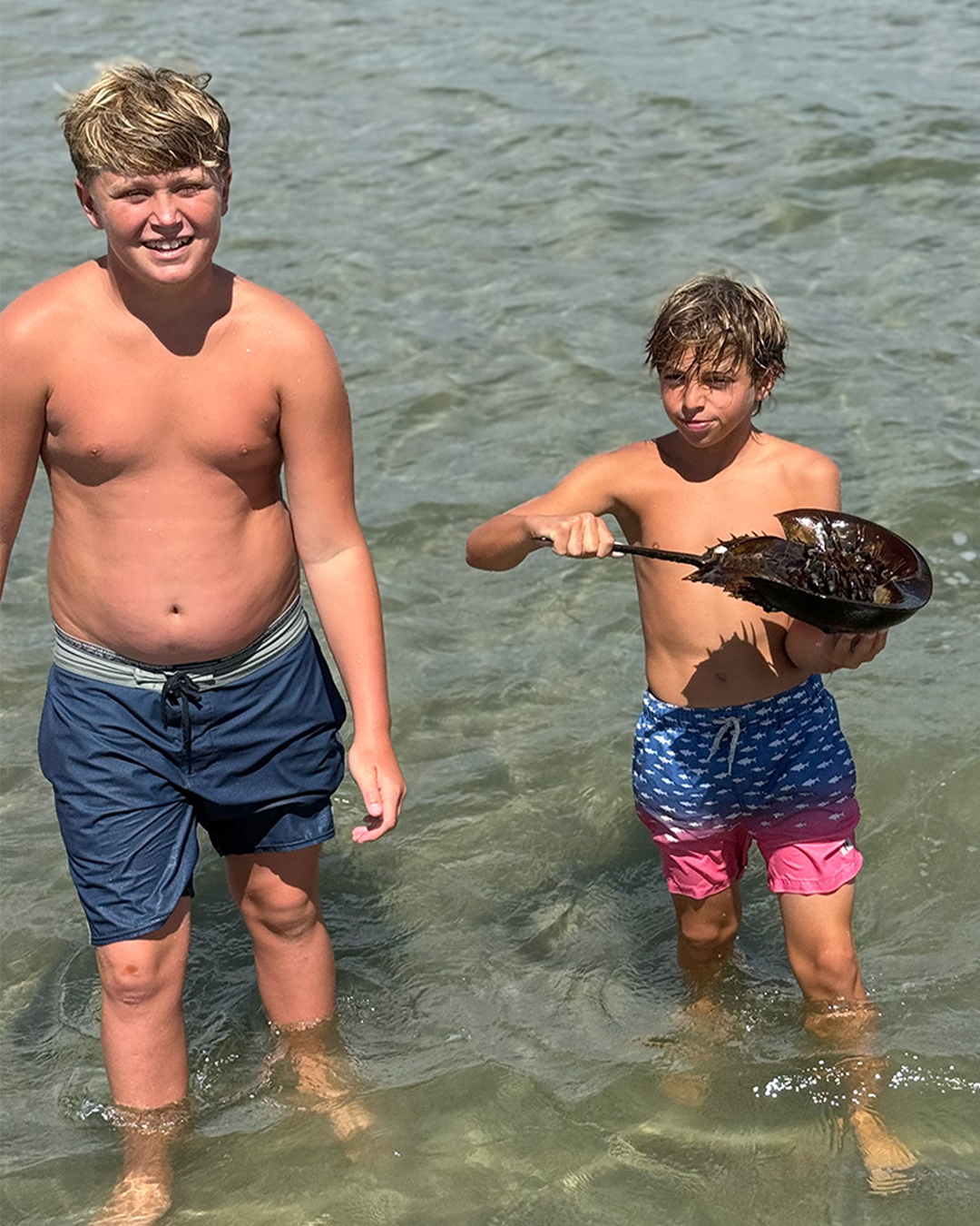 Campers learning hands-on boating skills at Wildwood summer camp