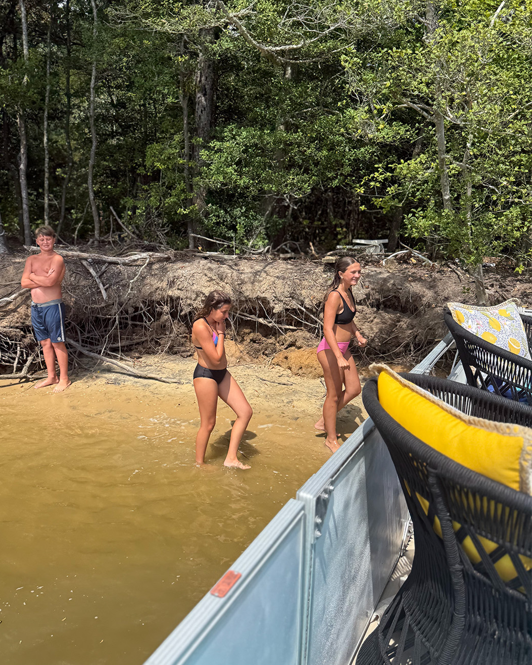 Junior boating camp adventure on a Wildwood pontoon boat cruise