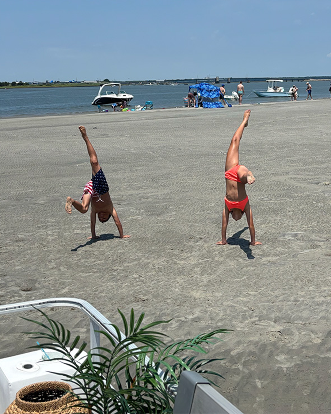 Kids at Wildwood summer camp learning boating skills on the back bay